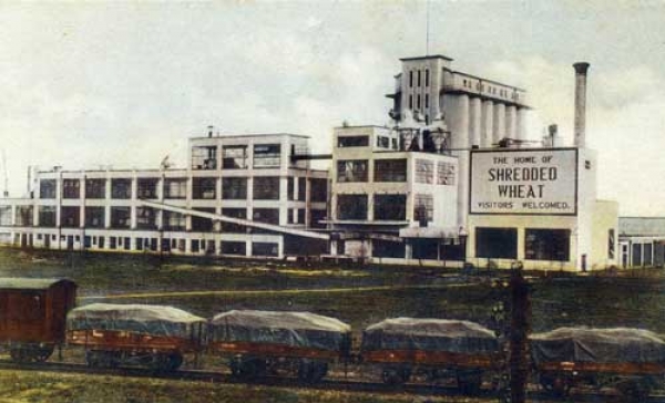 Shredded Wheat factory with rail trucks in foreground Shredded Wheat factory with rail trucks in foreground