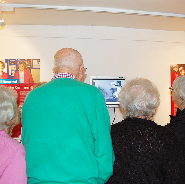 Watching a slideshow and listening to recorded memories