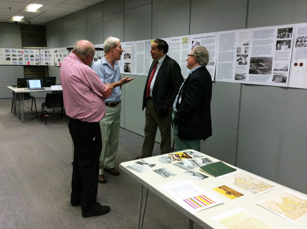 Lord Salisbury in discussion with three Trustees