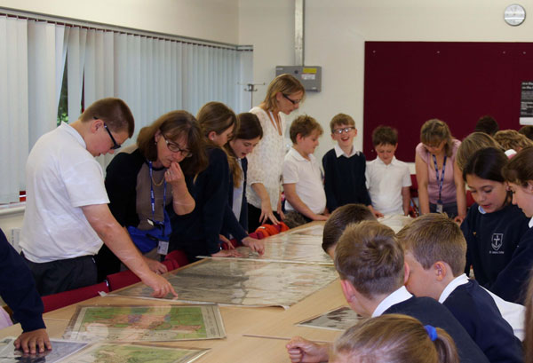 Pupils from St. John's School, Lemsford visiting WGC Library to view maps of WGC's industrial area before setting off on a guided walk with local historian Angela Eserin